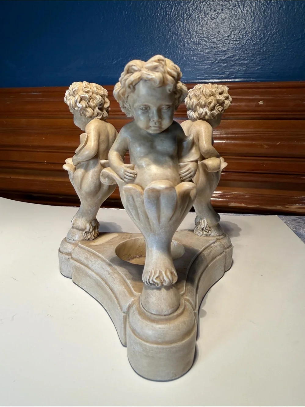 Vintage Resin Cherub Candle Holder features Three Cherubs Popping Out Of Flowers